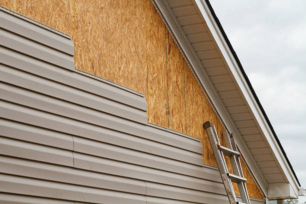 Professional Vinyl Siding technician working in Hopkinton, MA